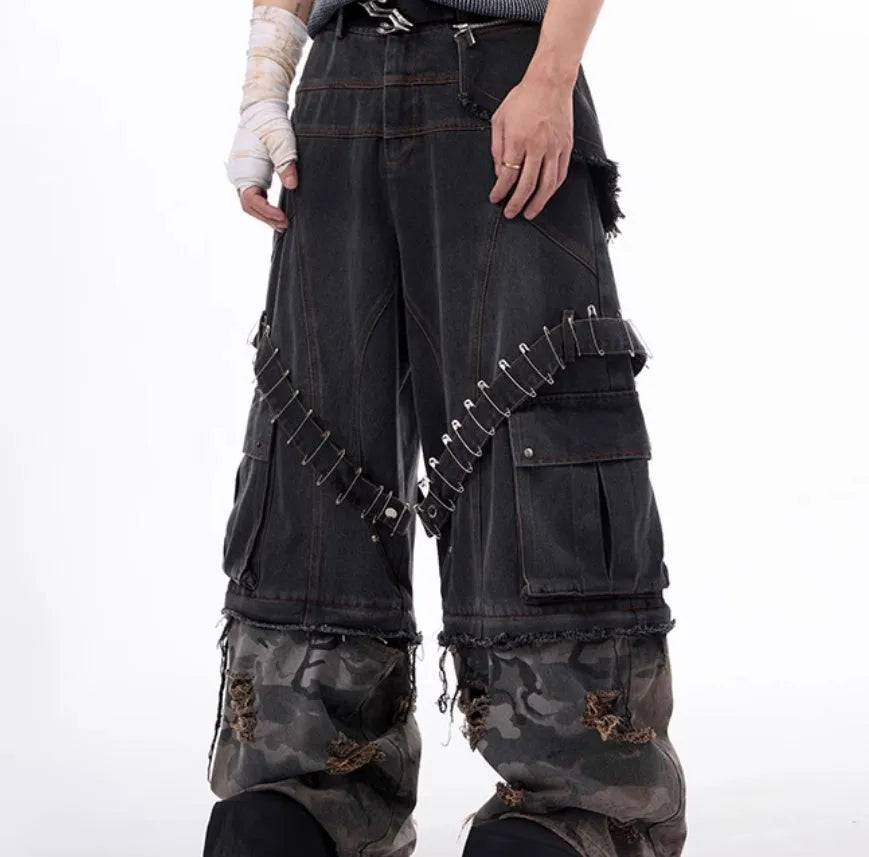 Men's grey camouflage jeans with pin and ribbon details on cotton denim.