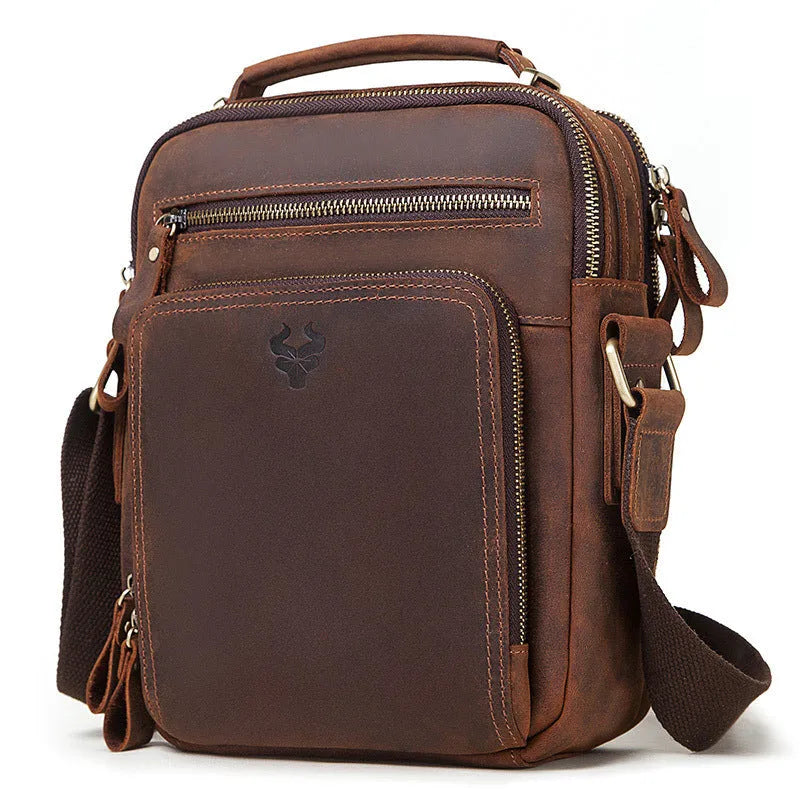 Men's brown leather crossbody bag with single-shoulder design showing sewing line details and business travel style