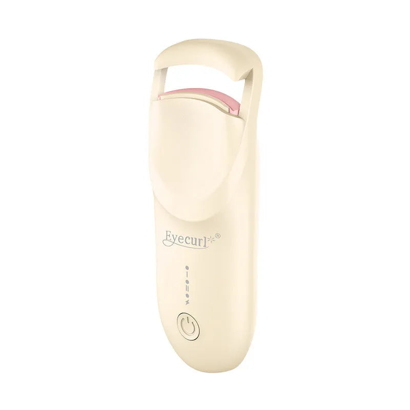 Plastic electric heating eyelash curler with USB cable in cream white, pink, or apricot.