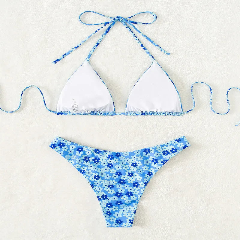 Women's blue printed lace-up swimsuit with sleeveless top and matching shorts