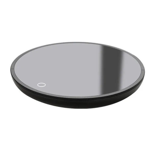 Black circular USB cup warmer pad with a tempered glass surface and dual temperature switch
