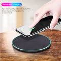 Black Quick Qi wireless charging pad for iPhone 11 with USB-C cable