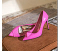 Women's pink pointed toe stiletto high heels with buckle closure and patent leather uppers