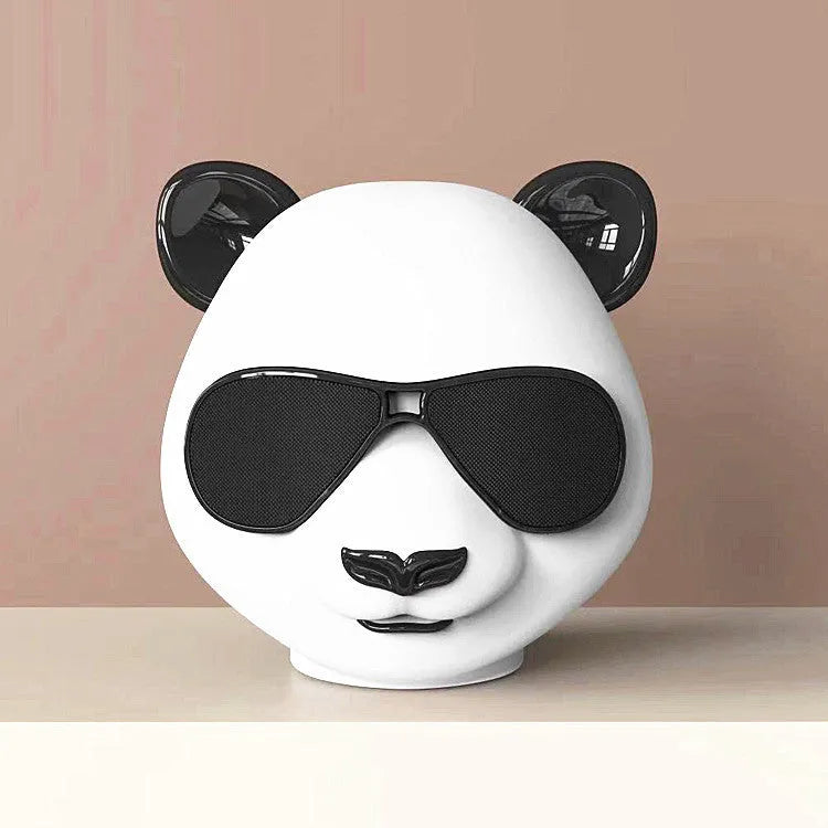 Classic style portable mini Bluetooth speaker on a table
