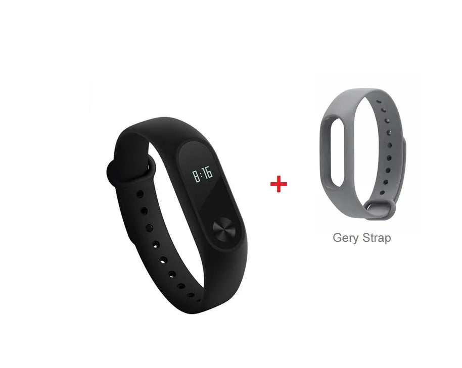 Black Xiaomi Mi Band 2 fitness tracker with OLED screen on a wrist.