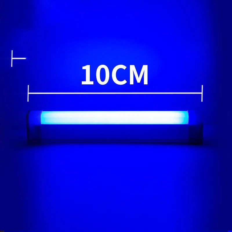 Blue and purple rechargeable LED tube light with USB cable on a dark background.
