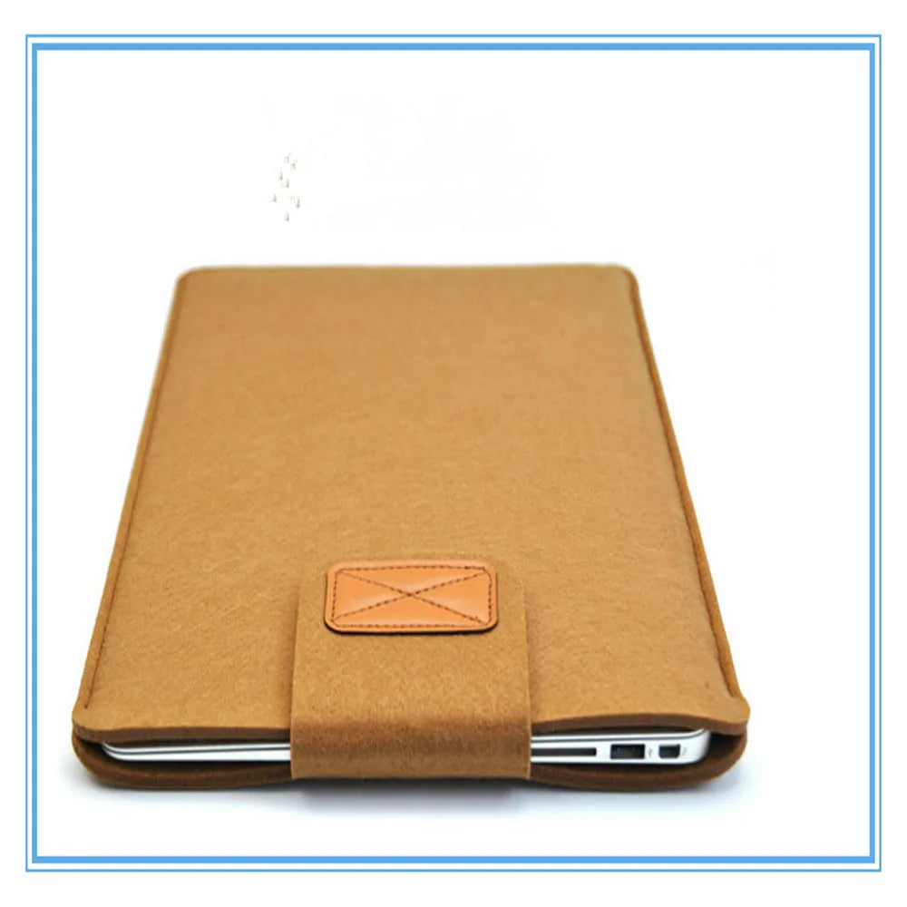Frosted woven laptop bag with plush felt interior shown open to reveal corner protectors and organised storage