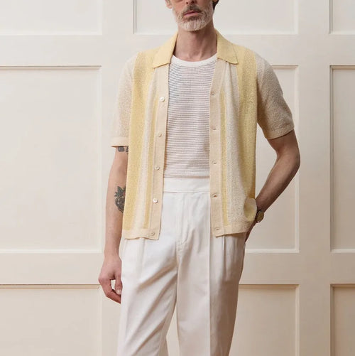 Yellow casual polo shirt with hollow-out design and asymmetric hem, short sleeves, Tencel fabric