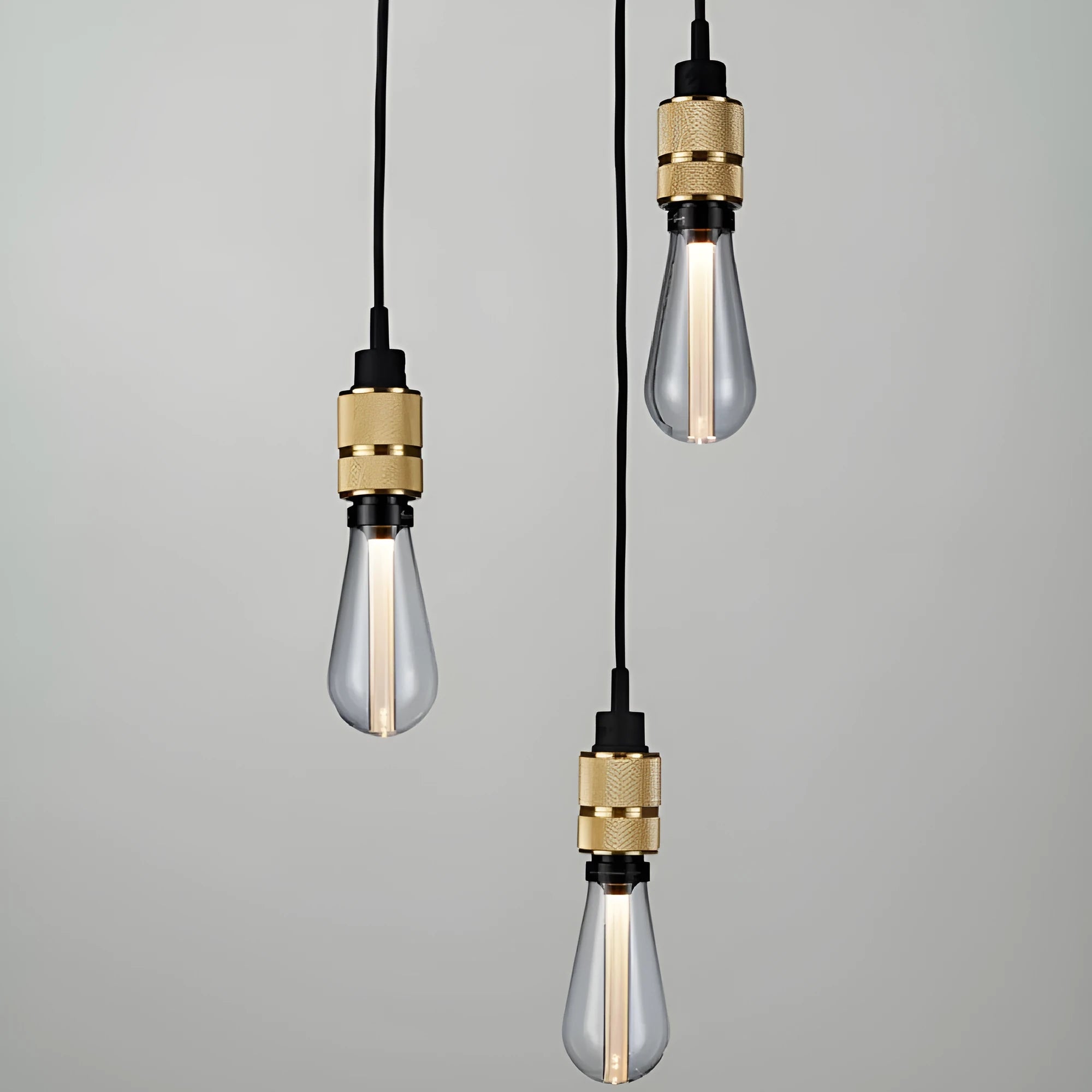 Retro DIY ceiling light chandelier kit with cast aluminum holder and woven power cord in shiny black and gold finishes