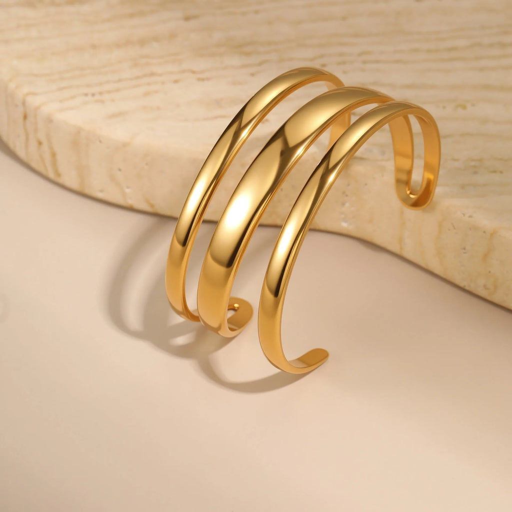Stainless steel geometric line bracelet for women with simple opening clasp in gold or steel colour