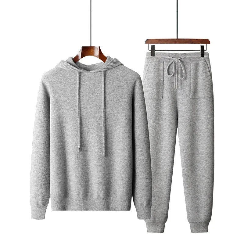 Men's dark grey cashmere hooded sweatshirt and trousers winter casual set laid flat