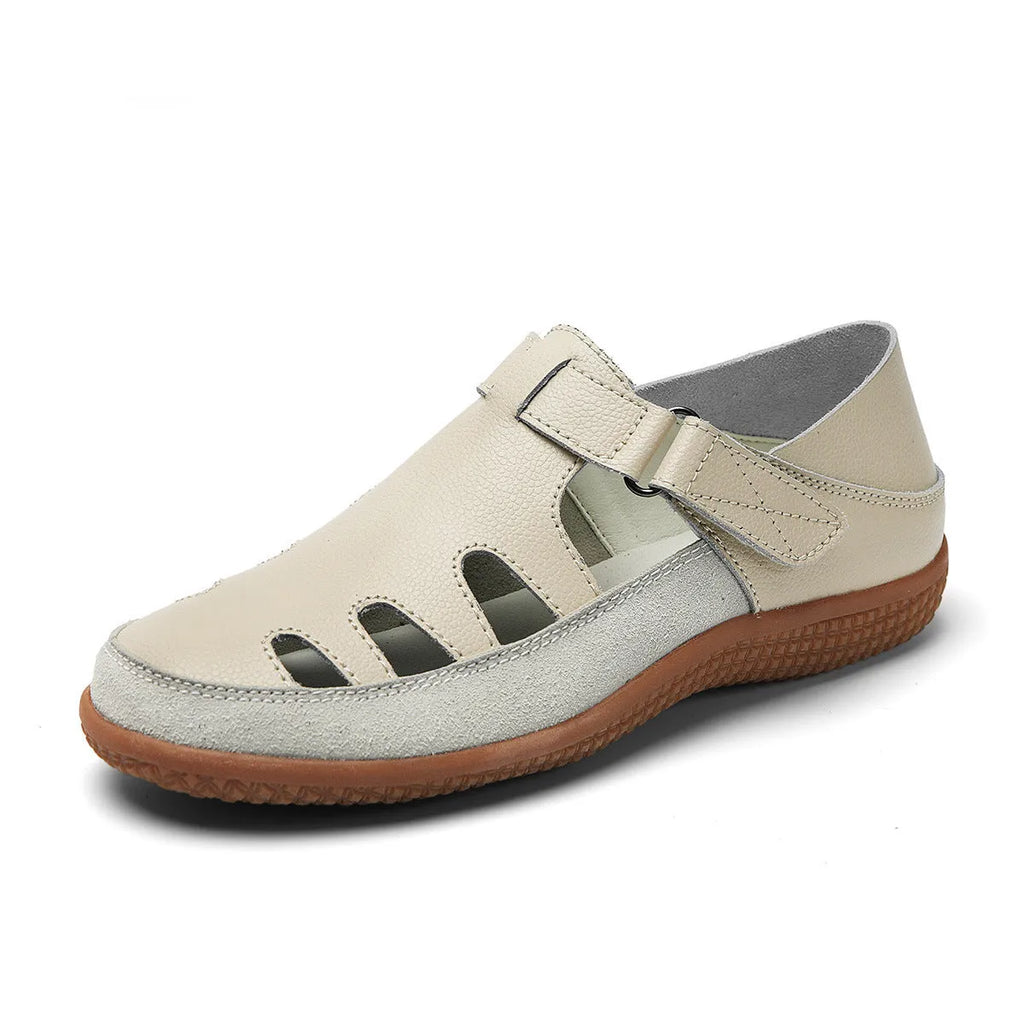 Plus size women's flat sandals in blue with hollow toe cap and thick rubber sole