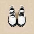 Women's Duke Asterism coloured loafers with a metal cross shoulder strap and round toe.