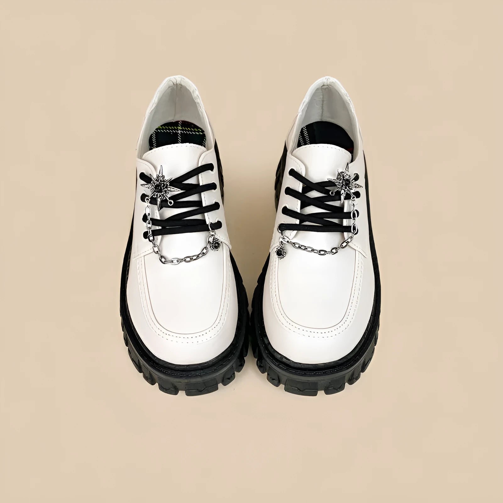 Women's Duke Asterism coloured loafers with a metal cross shoulder strap and round toe.