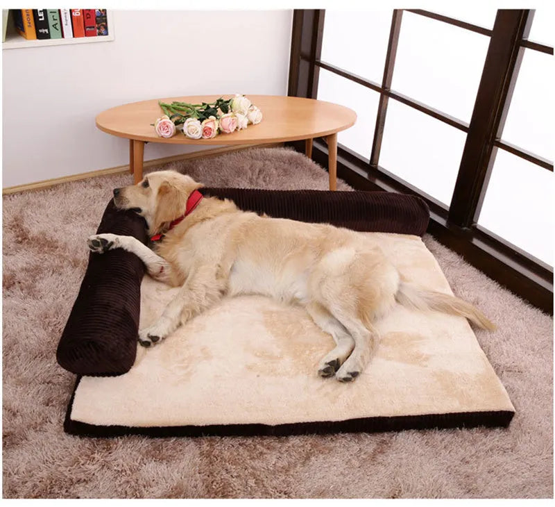 Corduroy fabric pet sofa dog bed in a grey colour, showing raised sides and plush high-density sponge padding.
