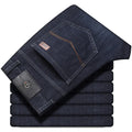 Men's black straight-leg stretch jeans with mid-waist and zip closure on plus size model