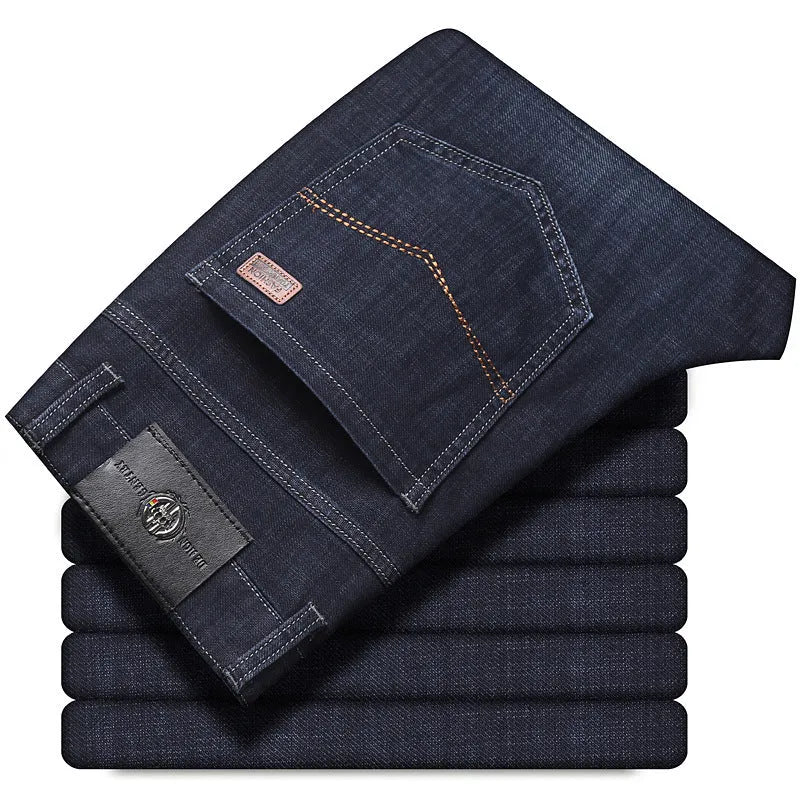 Men's black straight-leg stretch jeans with mid-waist and zip closure on plus size model