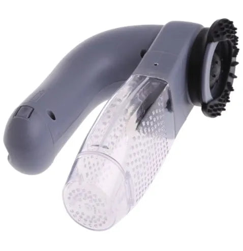 Grey portable pet hair vacuum cleaner with soft rubber head and large collection canister on a fabric sofa.