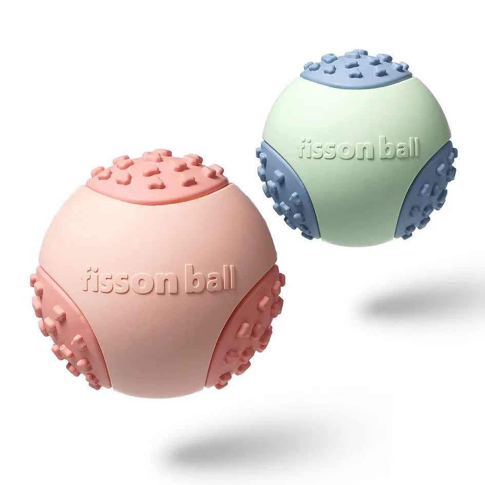 Green and pink rolling ball dog toy for small and medium breeds