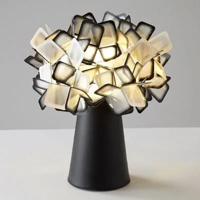 Nordic style metal bedside table lamp in multiple colours with a three-colour light source.