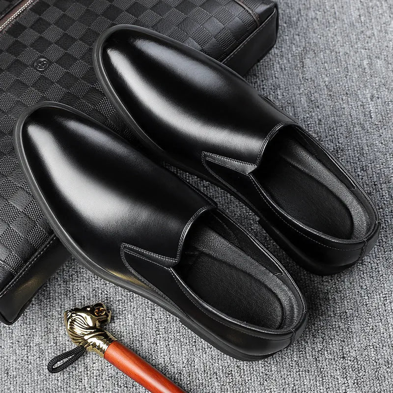 Men's black leather slip-on business casual shoes with rubber sole and low top design