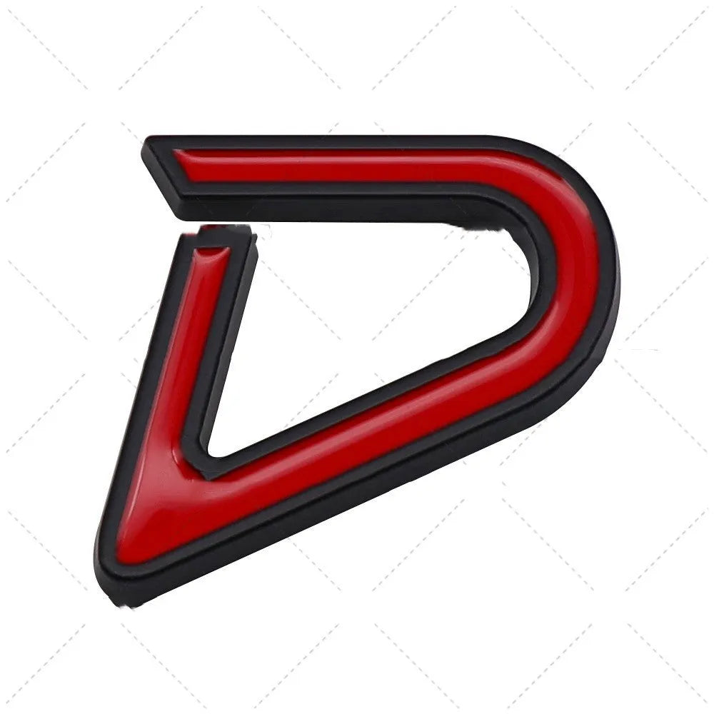 Red and silver SD-shaped metal decorative sticker for cars next to smaller red and black D-shaped sticker.