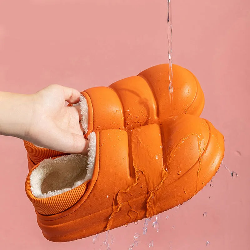 Women's waterproof garden slipper in green with plush lining and a textured non-slip EVA sole.