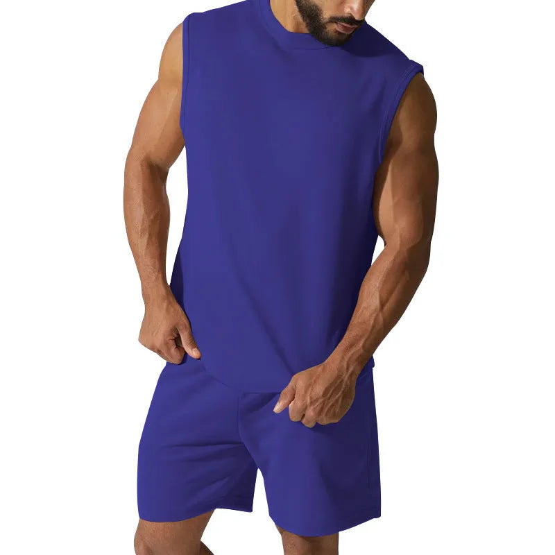 Men's sleeveless cotton blend sports top and shorts set in a solid colour.