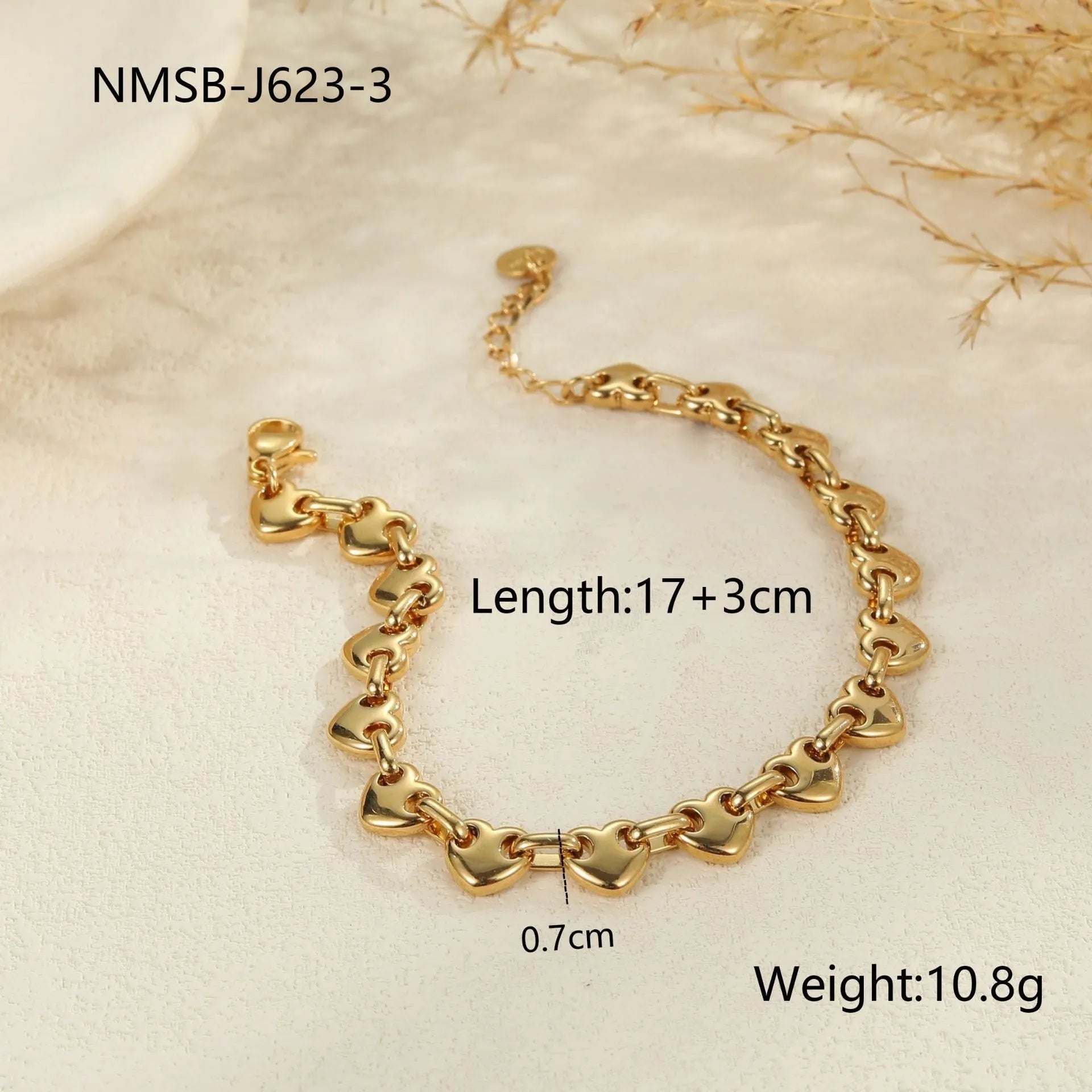 Women's hollowed-out heart bracelet in gold finish with geometric design and stainless steel construction
