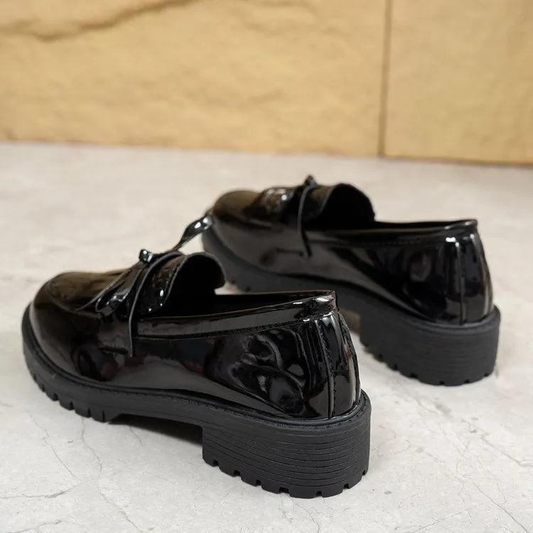 Women's black and brown bow loafers in artificial PU material with slip-on design for spring and autumn wear