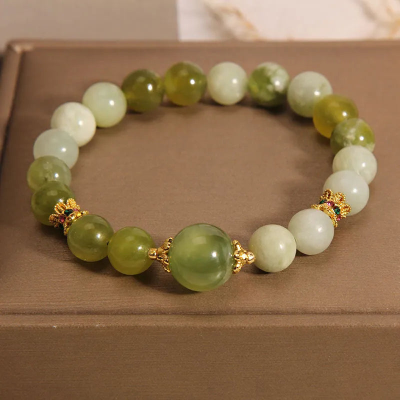 Women's bracelet made from green Xiuyan jade with original light luxury sweet mori design.