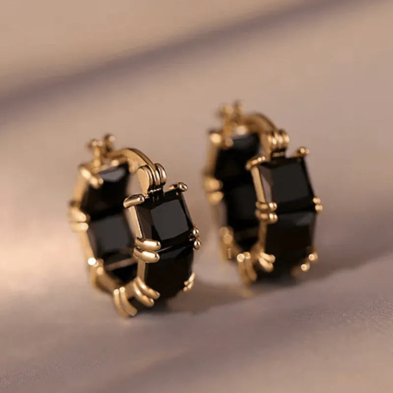 Geometric U-shaped women's earrings with round zircon elements and gold electroplated finish