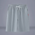 Cotton and linen cropped pants in army green with drawstring waist closure