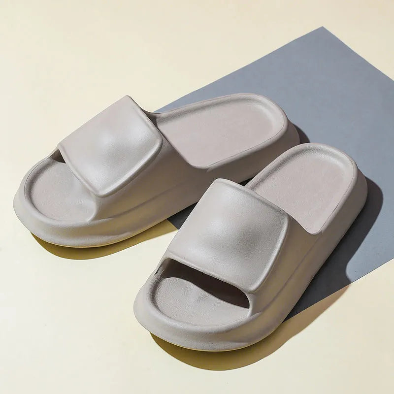 Thick sole EVA flip flop slippers in multiple colours on a white background.