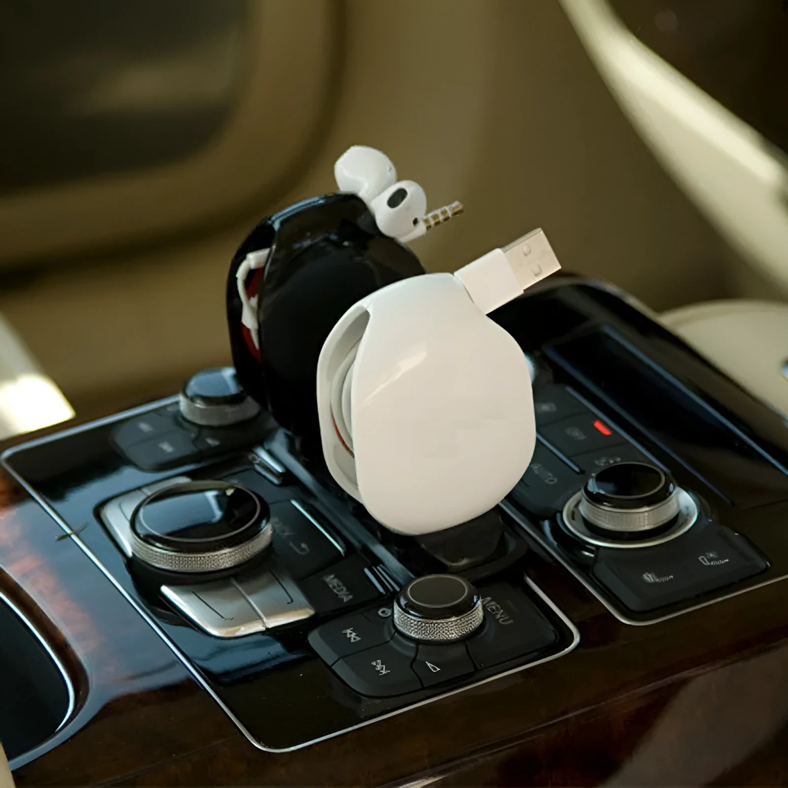 Automatic earphone retractor reel made of PC ABS in black blue and white colors with telescopic winder mechanism