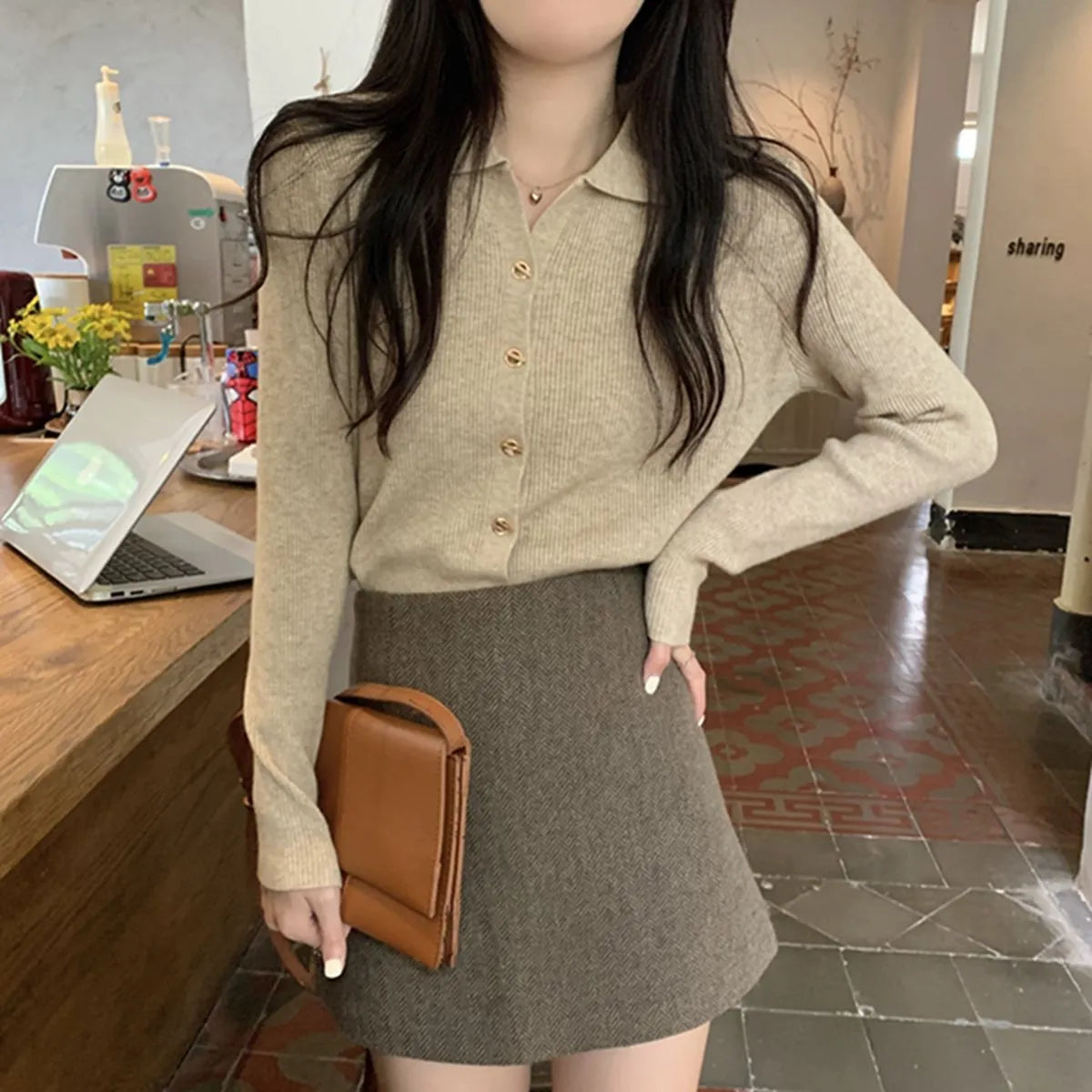 Women's long sleeve loose fit knitted cardigan in viscose fibre, shown in beige colour.