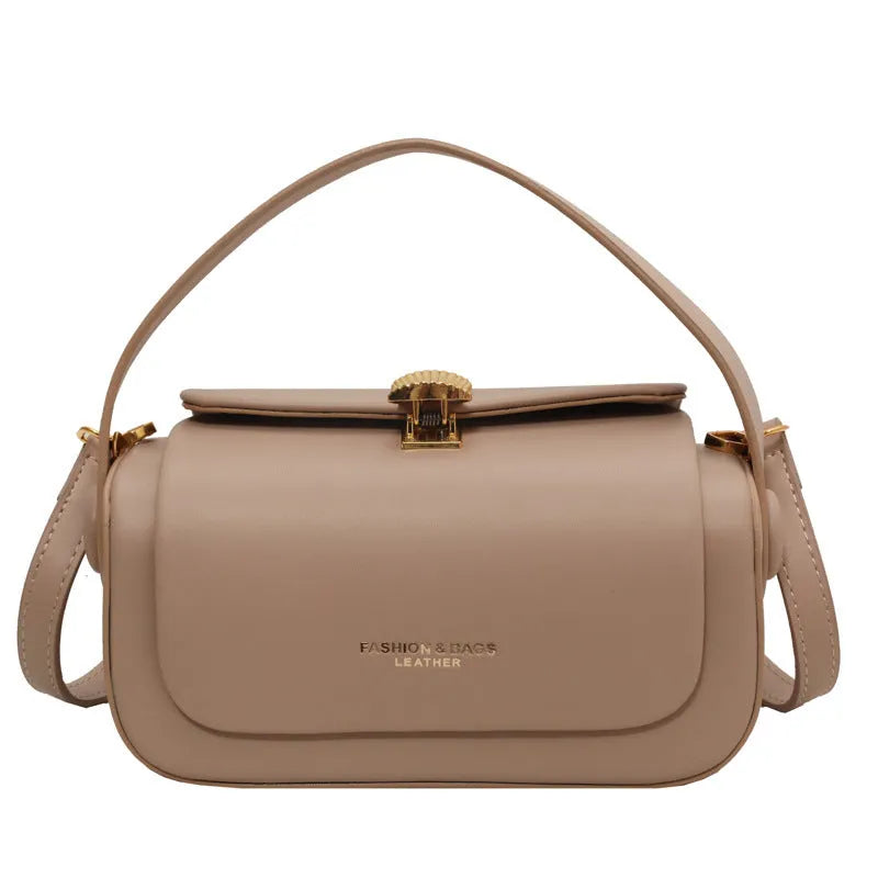 Women's personalised PU leather messenger bag with embossed lettering in beige colour