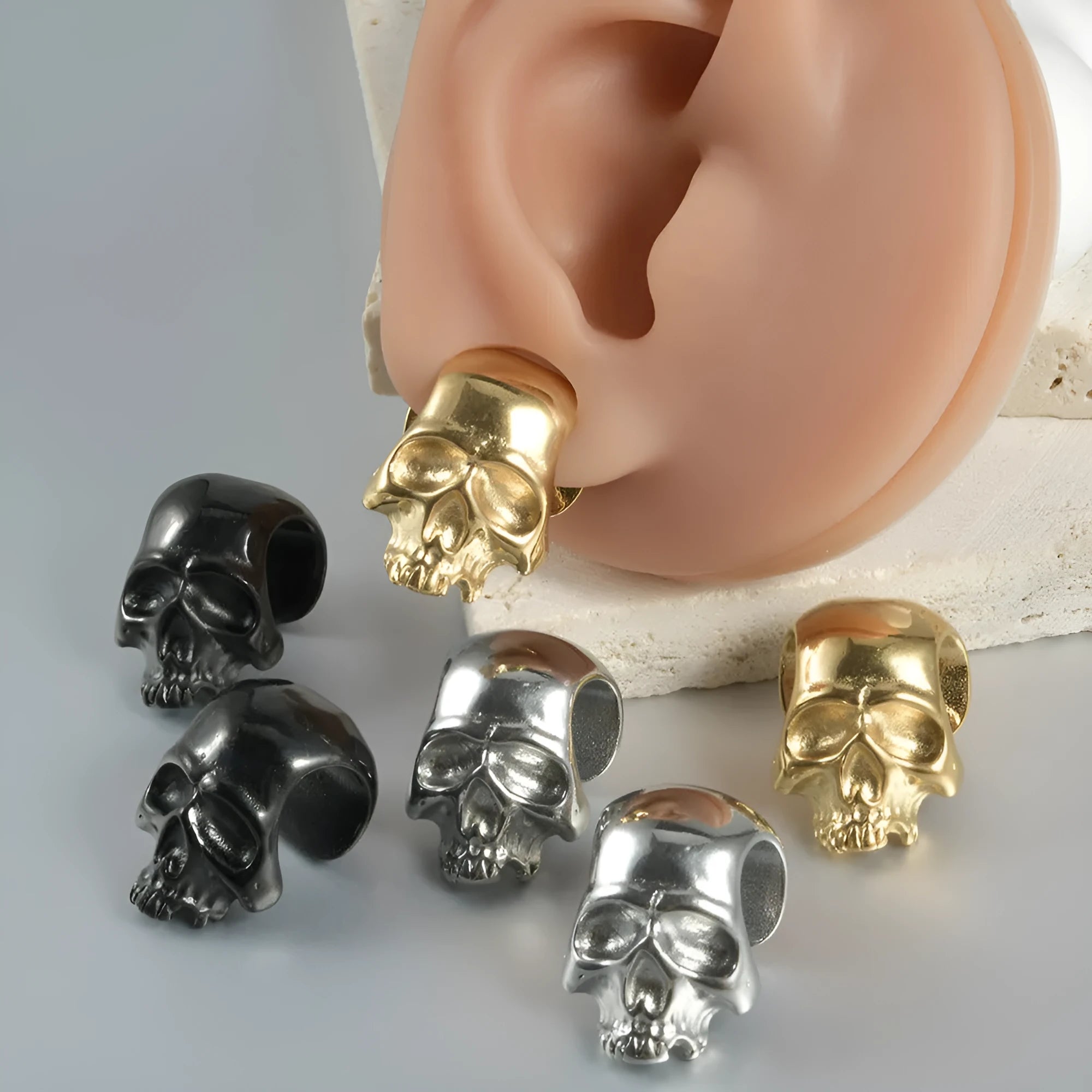 Stainless steel hollow skull Buddha geometric earrings with electroplated colour finishes