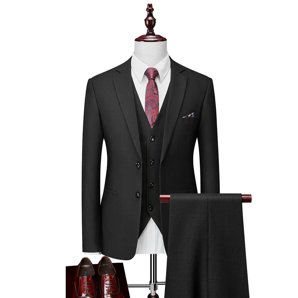 Men's navy blue slim fit plaid three-piece suit with vest, jacket, and trousers on a hanger.
