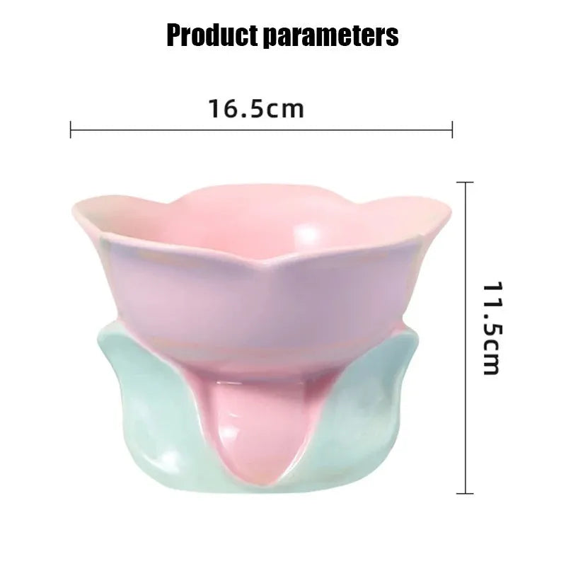 Blue ceramic elevated pet bowl with floral pattern for cats and small dogs on a non-slip base.