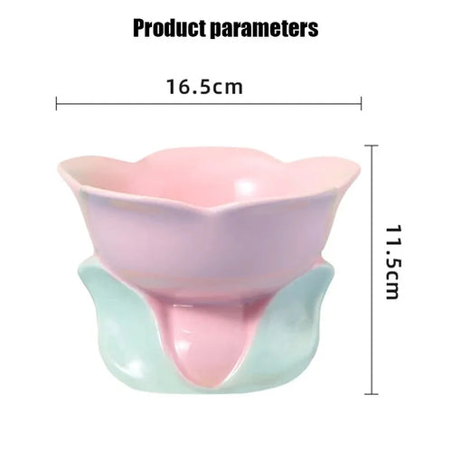 Blue ceramic elevated pet bowl with floral pattern for cats and small dogs on a non-slip base.