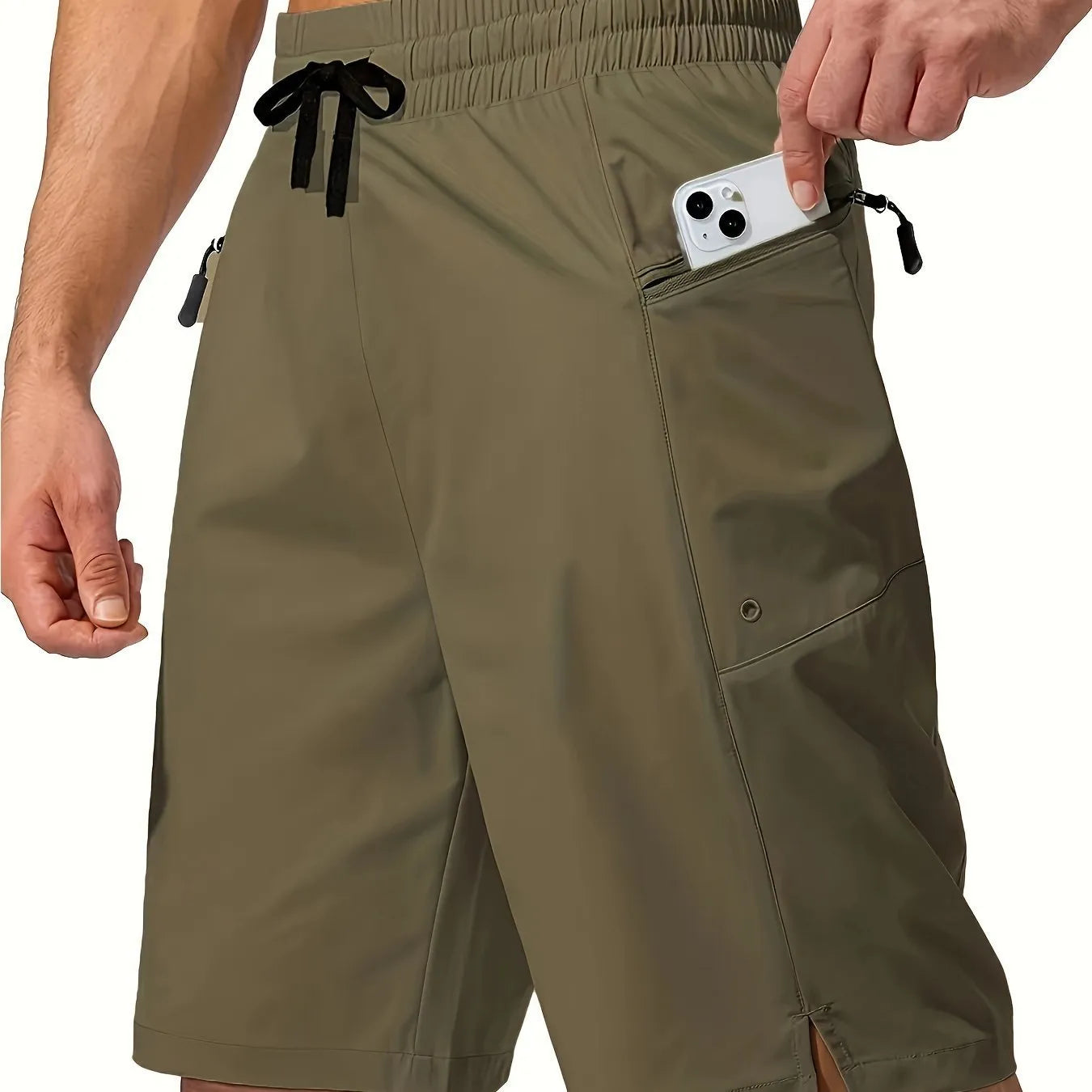 Man wearing solid grey quick-drying polyester beach shorts with a straight leg design.