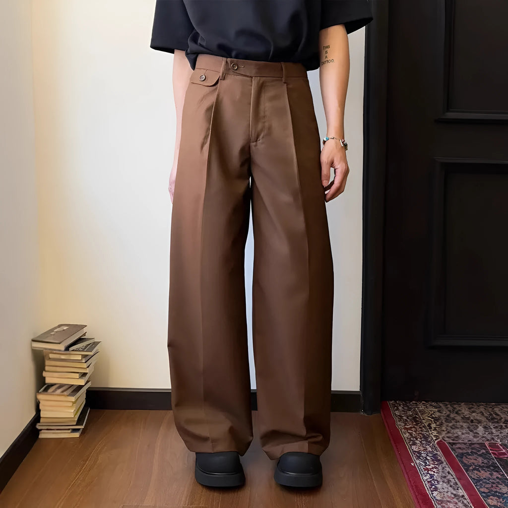 Men's straight-leg casual trousers in polyester blend fabric showing drape and wider cut design
