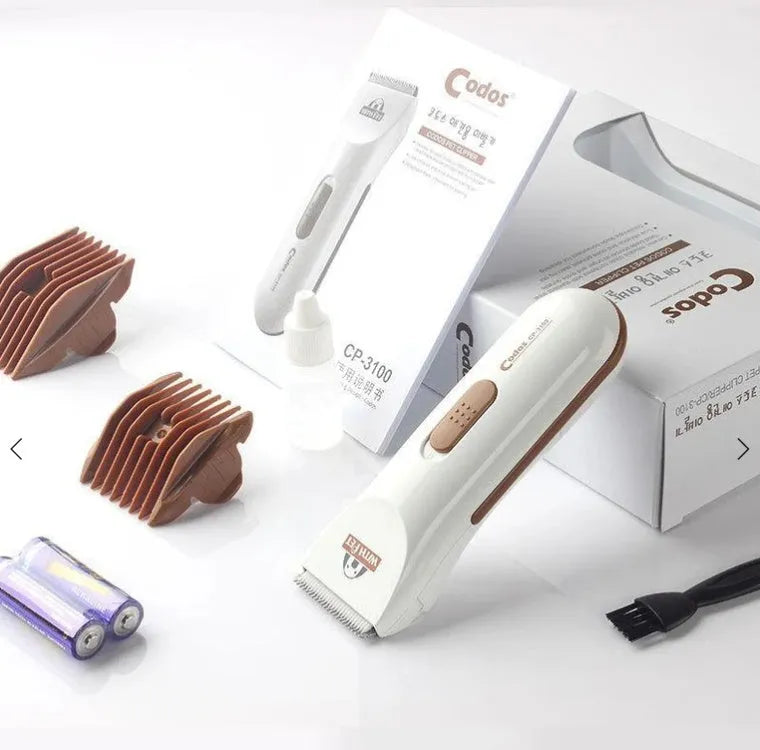 White pet hair clipper with ceramic blade and AA battery operation for home grooming