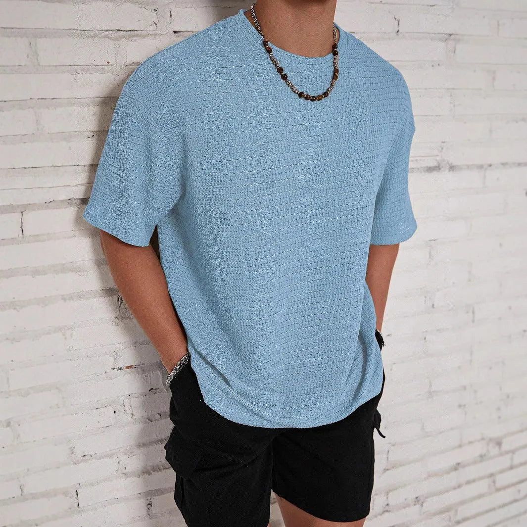 Men's slim-fit loose hollow polyester t-shirt in light blue colour.