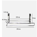 Silver stainless steel paper towel rack mounted on kitchen cabinet door