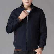 A grey men's sporty fleece jacket with long sleeves and a stick pocket, shown on a hanger.