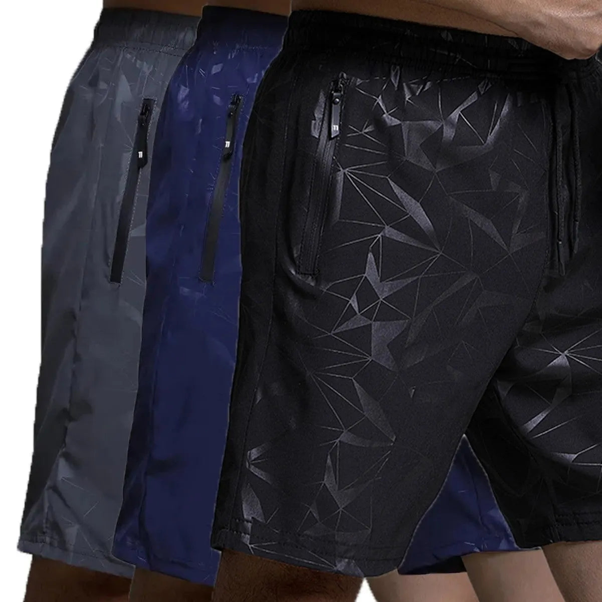 Man wearing loose grey polyester sports shorts with an elastic waistband.