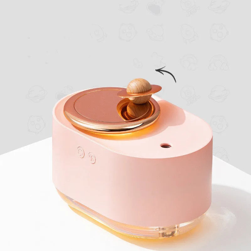 Rotating planet humidifier in colourful ABS plastic with USB charging cable