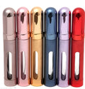 Slender 12ml aluminium portable perfume bottle with glass liner in choice of six colours.